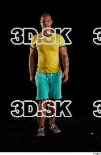 Walking reference of yellow shirt turquoise shorts brown shoes Leland…